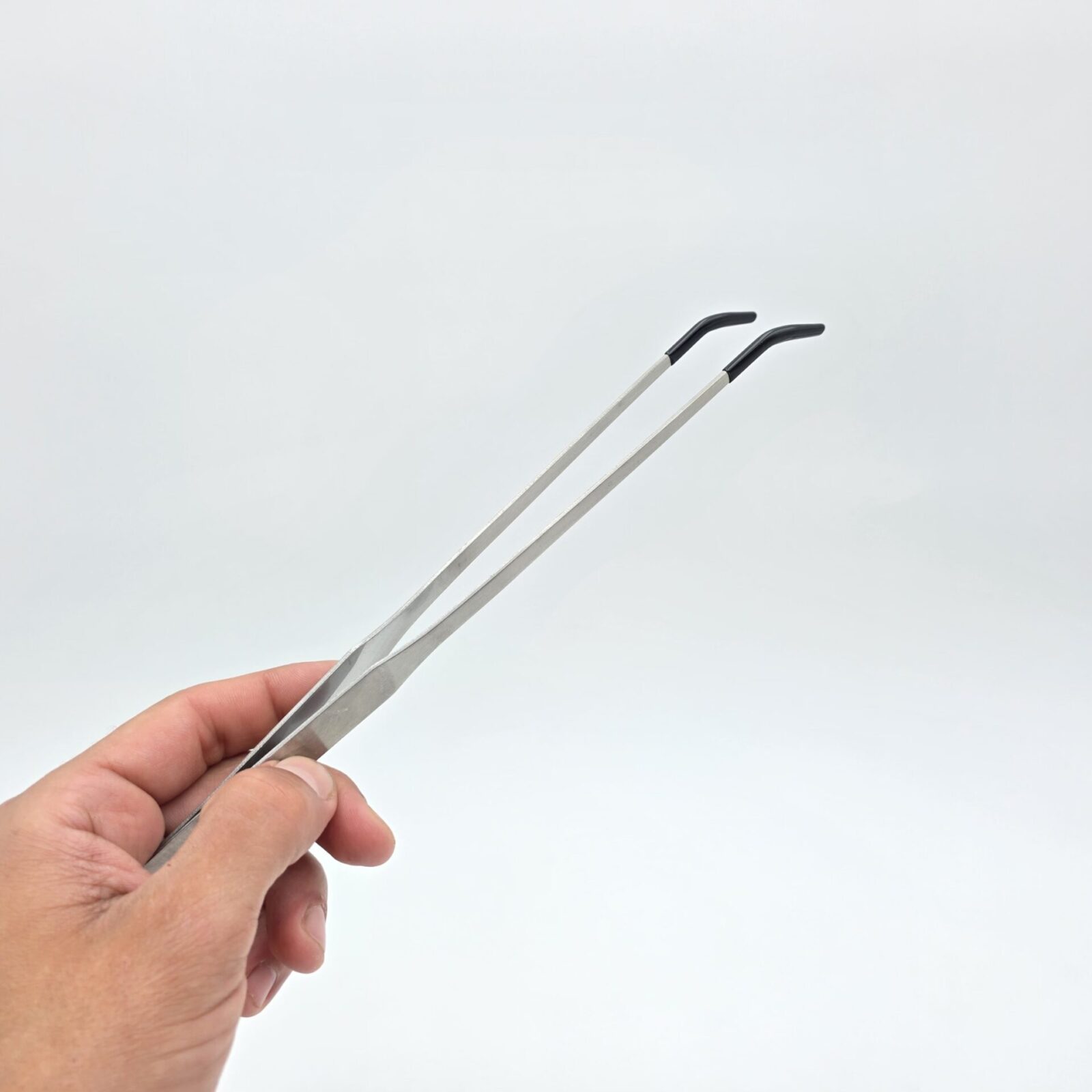 Pince nourrissage 26 cm courbé avec embout de protection