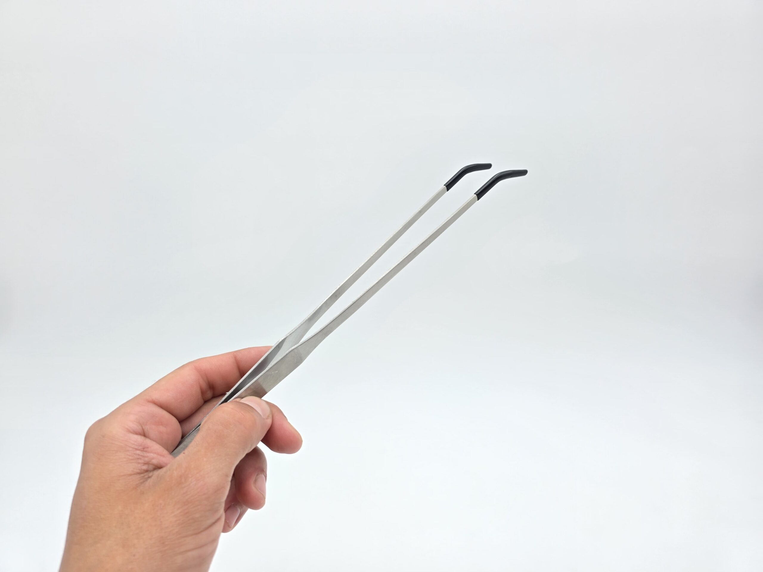 Pince nourrissage 26 cm courbé avec embout de protection